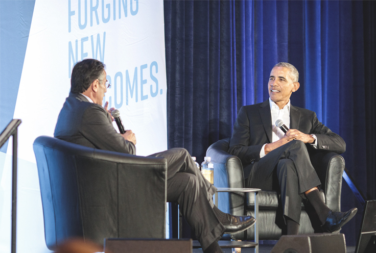 President Obama on stage at a conference
